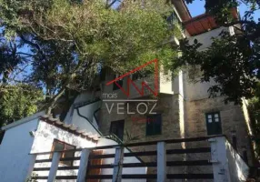 Foto 1 de Casa com 6 Quartos à venda, 1178m² em Laranjeiras, Rio de Janeiro