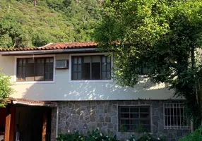 Foto 1 de Casa de Condomínio com 4 Quartos à venda, 320m² em Barra da Tijuca, Rio de Janeiro