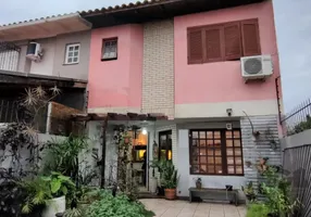Foto 1 de Casa com 3 Quartos à venda, 115m² em Guarujá, Porto Alegre