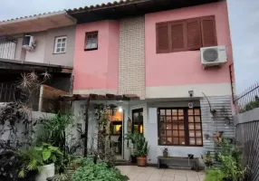 Foto 1 de Casa com 3 Quartos à venda, 116m² em Guarujá, Porto Alegre