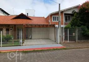 Foto 1 de Casa com 4 Quartos à venda, 98m² em Canasvieiras, Florianópolis