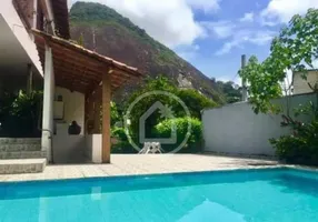 Foto 1 de Casa com 4 Quartos à venda, 382m² em Laranjeiras, Rio de Janeiro