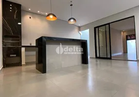 Foto 1 de Casa com 3 Quartos à venda, 180m² em Alto Umuarama, Uberlândia