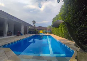 Foto 1 de Casa de Condomínio com 4 Quartos à venda, 330m² em Balneário Praia do Perequê , Guarujá