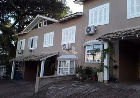 Foto 1 de Casa de Condomínio com 3 Quartos à venda, 109m² em Santa Tereza, Porto Alegre