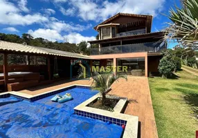 Foto 1 de Casa de Condomínio com 5 Quartos para venda ou aluguel, 450m² em Balneario Água Limpa, Nova Lima
