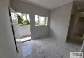 Foto 1 de Apartamento com 2 Quartos à venda, 56m² em Centro, Peruíbe