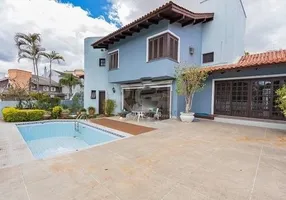 Foto 1 de Casa com 4 Quartos para alugar, 430m² em Chácara das Pedras, Porto Alegre
