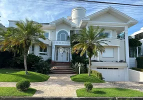 Foto 1 de Casa com 5 Quartos para alugar, 320m² em Jurerê Internacional, Florianópolis