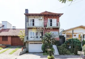 Foto 1 de Casa com 4 Quartos à venda, 297m² em Espiríto Santo, Porto Alegre