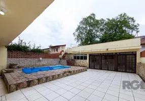 Foto 1 de Casa com 4 Quartos à venda, 452m² em Nonoai, Porto Alegre