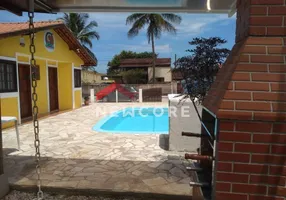 Foto 1 de Casa de Condomínio com 4 Quartos à venda, 173m² em Massaguaçu, Caraguatatuba