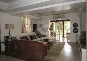 Foto 1 de Casa com 4 Quartos para alugar, 380m² em Auxiliadora, Porto Alegre