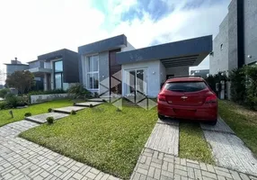 Foto 1 de Casa de Condomínio com 3 Quartos à venda, 135m² em Capao da Canoa, Capão da Canoa