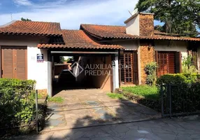 Foto 1 de Casa com 4 Quartos à venda, 280m² em Partenon, Porto Alegre