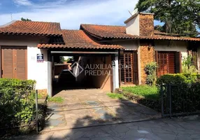 Foto 1 de Casa com 4 Quartos à venda, 465m² em Partenon, Porto Alegre