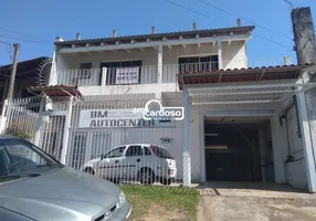 Foto 1 de Sobrado com 4 Quartos à venda, 200m² em Jardim Carvalho, Porto Alegre