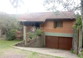 Foto 1 de Casa com 2 Quartos à venda, 120m² em Vila Nova, Porto Alegre