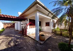 Foto 1 de Casa com 4 Quartos à venda, 140m² em Albatroz, Imbé