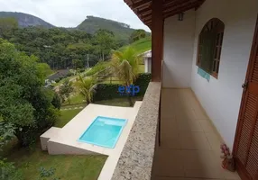 Foto 1 de Casa de Condomínio com 4 Quartos à venda, 218m² em Sebastiana, Teresópolis