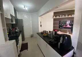 Foto 1 de Apartamento com 2 Quartos à venda, 58m² em Jardim Henriqueta, Taboão da Serra