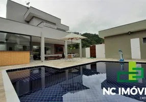 Foto 1 de Casa de Condomínio com 4 Quartos para alugar, 200m² em Mar Verde, Caraguatatuba