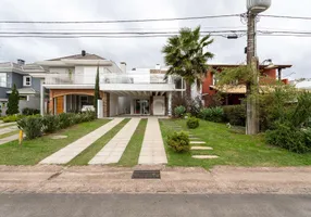 Foto 1 de Casa de Condomínio com 5 Quartos à venda, 293m² em Belém Novo, Porto Alegre