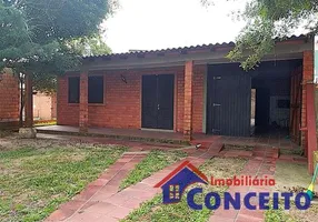 Foto 1 de Casa com 4 Quartos à venda, 160m² em Harmonia, Imbé