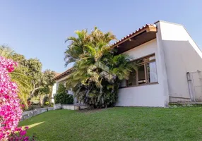 Foto 1 de Casa de Condomínio com 3 Quartos à venda, 450m² em Cavalhada, Porto Alegre