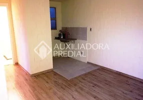 Foto 1 de Apartamento com 2 Quartos à venda, 39m² em Vila Nova, Porto Alegre