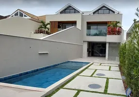 Foto 1 de Casa de Condomínio com 4 Quartos à venda, 234m² em Barra da Tijuca, Rio de Janeiro