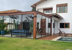 Foto 1 de Casa de Condomínio com 5 Quartos para venda ou aluguel, 340m² em Praia do Forte, Mata de São João