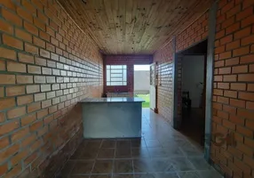 Foto 1 de Casa com 2 Quartos à venda, 39m² em Vila Nova, Porto Alegre