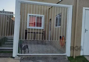 Foto 1 de Casa com 4 Quartos à venda, 121m² em Hípica, Porto Alegre