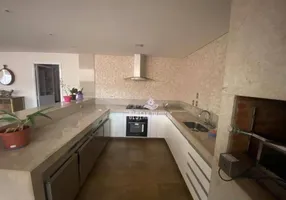 Foto 1 de Sobrado com 4 Quartos à venda, 438m² em Tubalina, Uberlândia