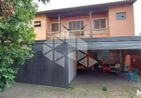 Foto 1 de Casa com 5 Quartos à venda, 115m² em Jardim Itú Sabará, Porto Alegre