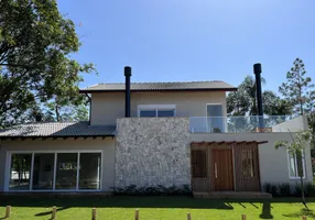 Foto 1 de Casa de Condomínio com 4 Quartos à venda, 245m² em Grama, Garopaba