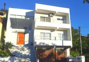Foto 1 de Casa de Condomínio com 3 Quartos à venda, 297m² em Condominio Cantegril, Viamão
