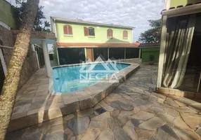 Foto 1 de Casa com 2 Quartos à venda, 71m² em Loteamento Jardim Aruan, Caraguatatuba