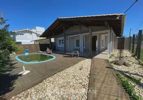 Foto 1 de Sobrado com 3 Quartos para alugar, 168m² em Zona Nova, Tramandaí