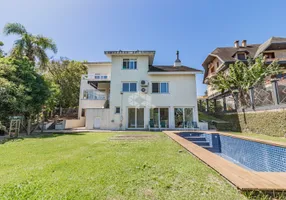 Foto 1 de Casa de Condomínio com 4 Quartos à venda, 270m² em Cavalhada, Porto Alegre