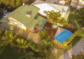 Foto 1 de Casa de Condomínio com 4 Quartos à venda, 300m² em Ibiraquera, Imbituba