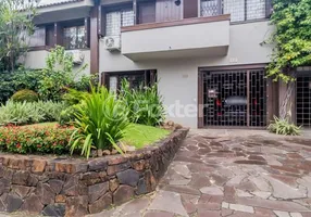 Foto 1 de Casa de Condomínio com 3 Quartos à venda, 180m² em Três Figueiras, Porto Alegre