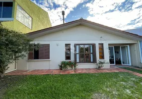 Foto 1 de Casa com 3 Quartos à venda, 105m² em Atlantida Sul, Osório