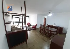 Foto 1 de Apartamento com 4 Quartos à venda, 100m² em Praia das Pitangueiras, Guarujá