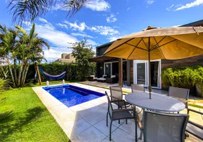 Foto 1 de Casa de Condomínio com 4 Quartos à venda, 220m² em Xangri la, Capão da Canoa