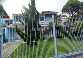 Foto 1 de Sobrado com 4 Quartos à venda, 235m² em Jardim Itú Sabará, Porto Alegre