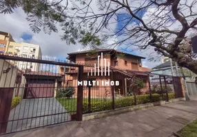 Foto 1 de Casa com 3 Quartos para alugar, 236m² em Menino Deus, Porto Alegre