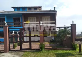 Foto 1 de Sobrado com 3 Quartos à venda, 140m² em Zona Nova, Tramandaí