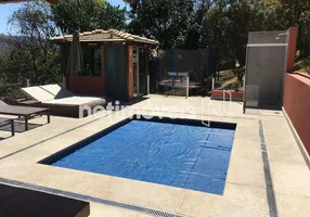 Foto 1 de Casa de Condomínio com 4 Quartos à venda, 500m² em Passárgada, Nova Lima